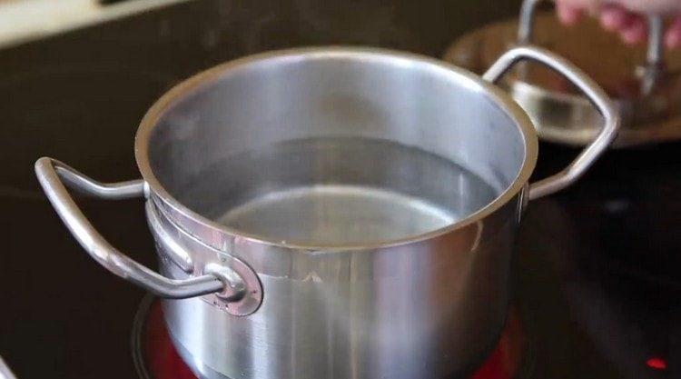 First bring the water to a boil.