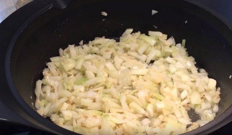 Lightly saute the onions and garlic.