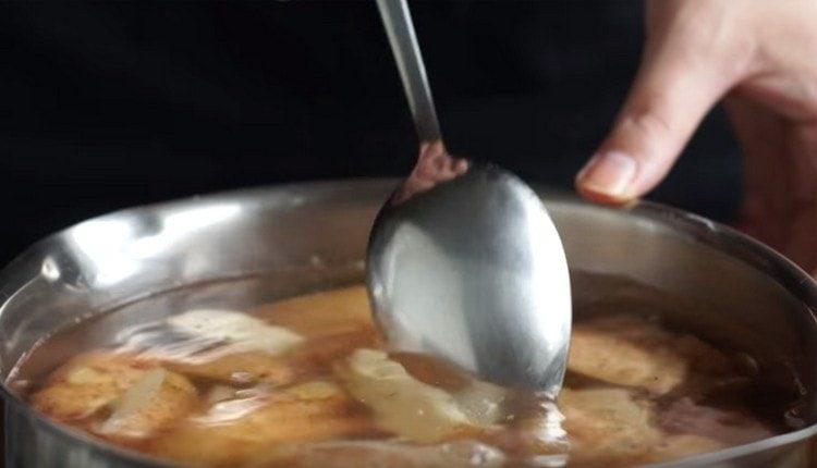 Boil potatoes until tender.