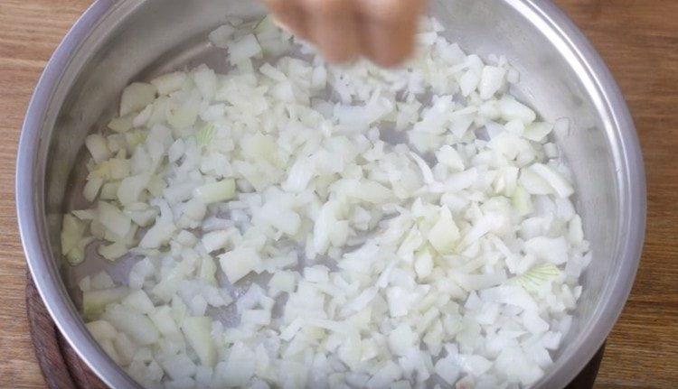 Add salt and sugar to the onion.