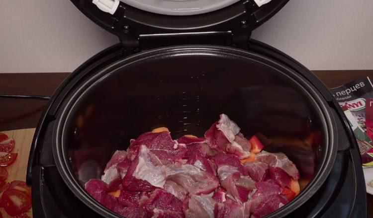 Add veal to the slow cooker.