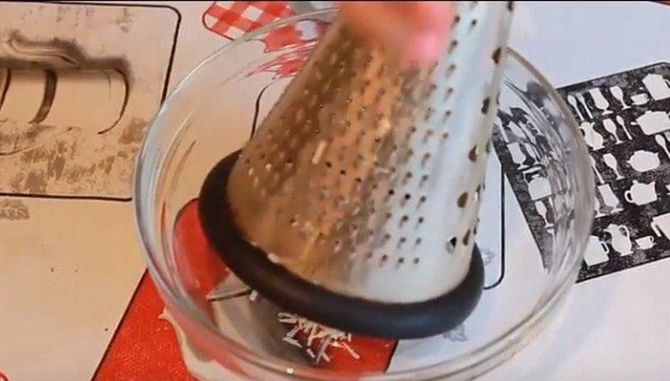 Rub the cheese on a fine grater.