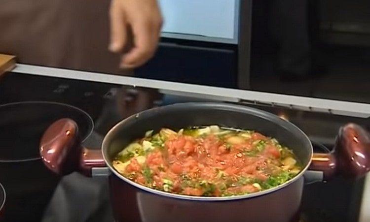 Add tomatoes, herbs, garlic, and in a few minutes our chicken soup in chicken broth is ready.