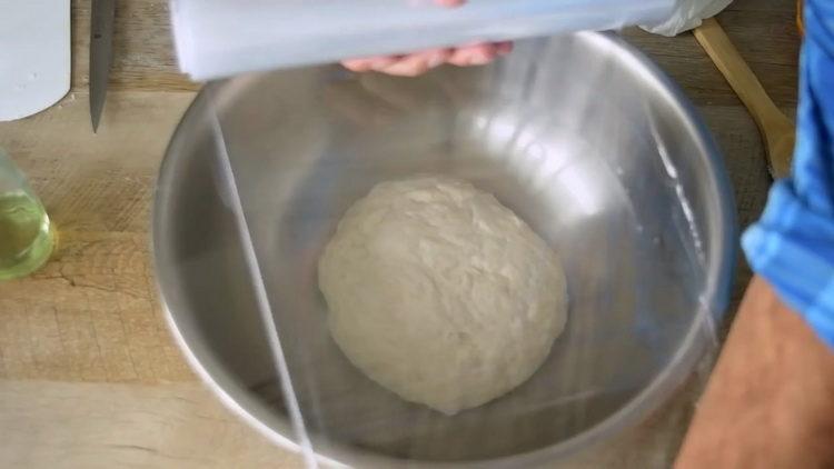 put the dough under the film
