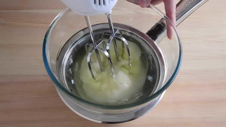 whip with a mixer cream in a water bath