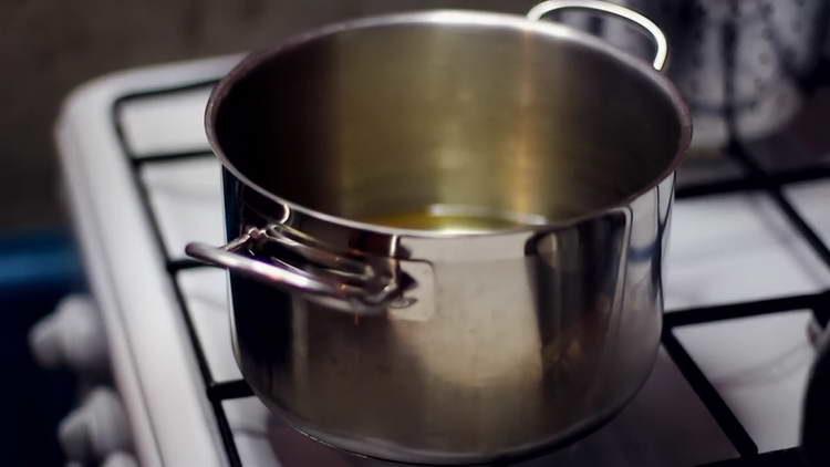 put oil in a saucepan