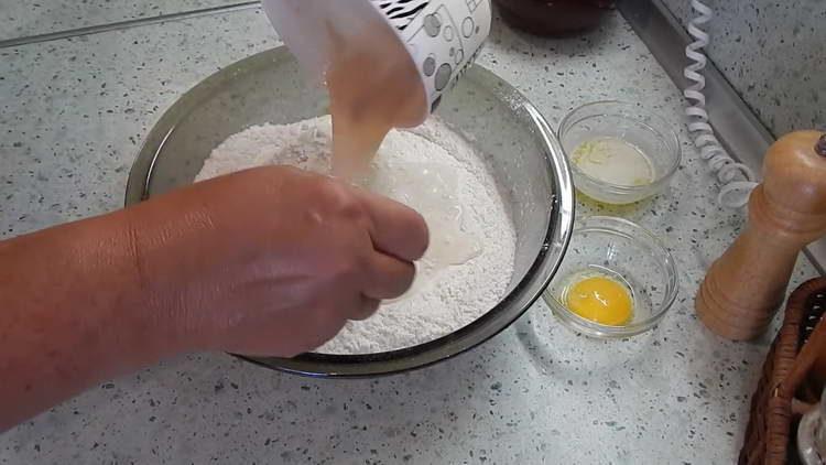 pour dough into flour