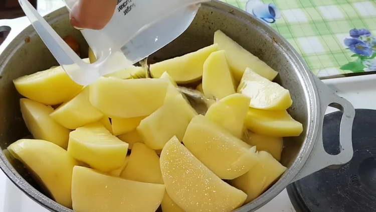 pour potatoes into a cauldron