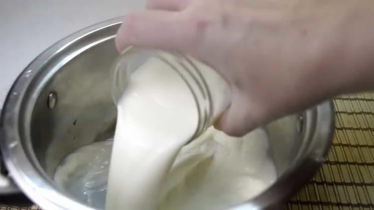 pour milk into the stewpan