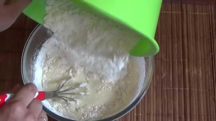 gradually introduce the flour into the liquid mixture