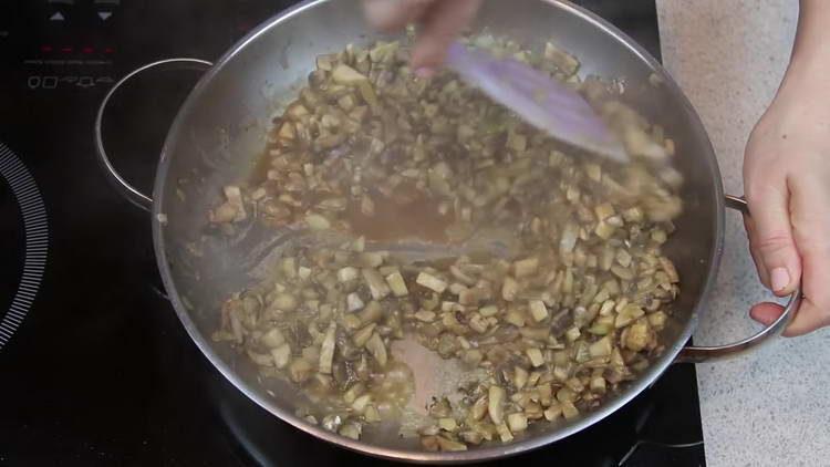 pour mushroom infusion into the pan