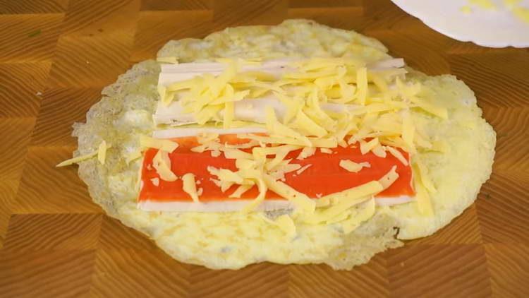 sprinkle with crab sticks cheese