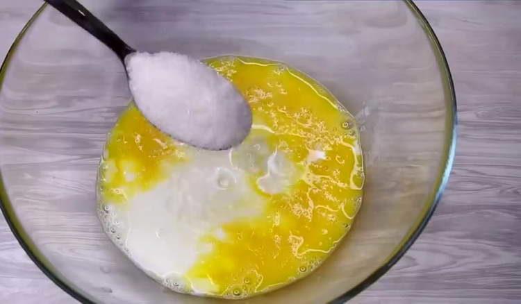 pour sugar into eggs