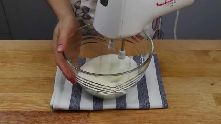 Beat 180 g of cream with a mixer